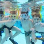 Kinderen onderwater tijdens de snorkelles